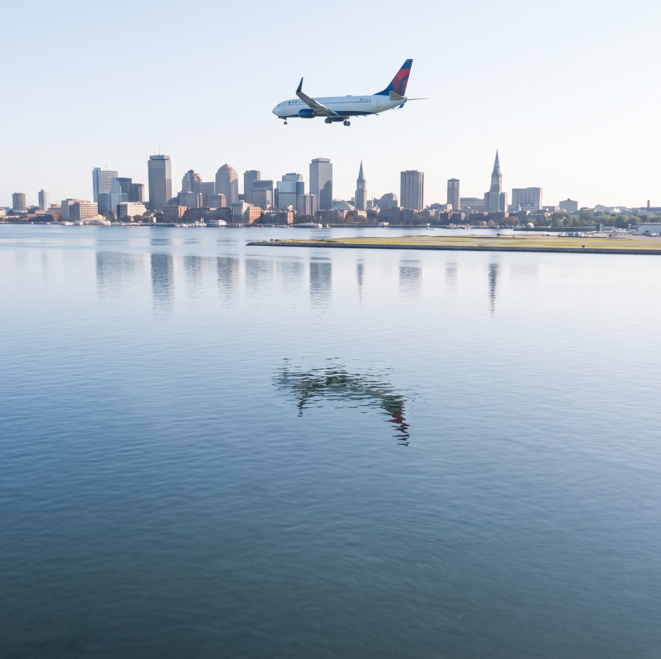 Boston skyline with airplane